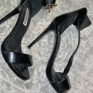 Black Steve Madden stiletto heel with ankle strap